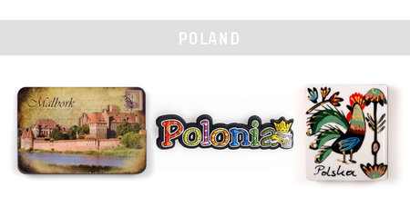 Souvenirs (magnets) from Poland isolated on white background. The text on the magnets from left to right means in English: "Malbork. Poland Post"; "Poland" "Poland"の写真素材