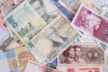 Banknotes of different countries isolated on white background