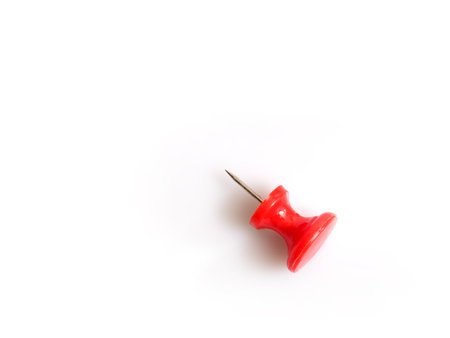 Red push pin isolated on a white background. Design element with clipping pathの写真素材