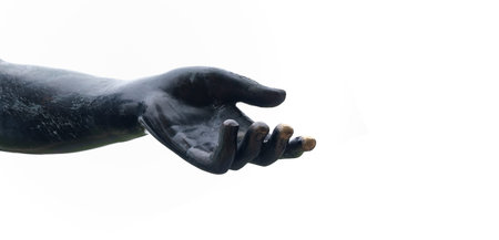 Bronze hand of antique statue in inviting gesture isolated on white background