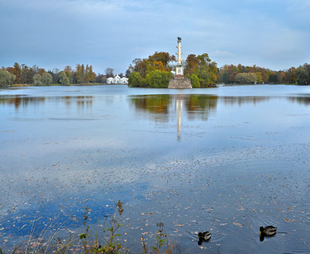 Chesme Column in the large pond in autumn, Tsarskoye Selo palace complex near St. Petersburg, Russiaの写真素材