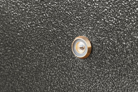 Isolated input metal door and peephole: background and textureの写真素材