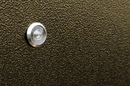 Isolated input metal door and peephole: background and textureの写真素材