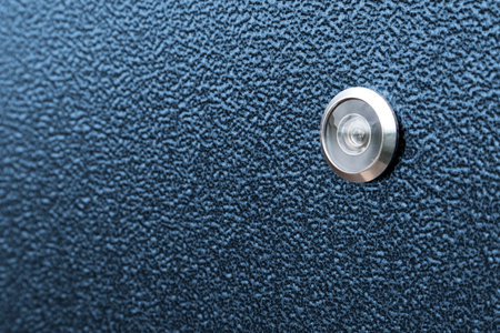 Isolated input metal door and peephole: background and textureの写真素材