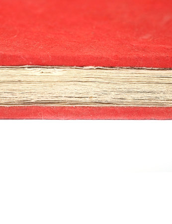 Red notebook handmade isolated on a white backgroundの写真素材