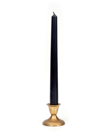 Gold candlestick with black candle isolated on white background, cutout ready. Extremely high resolutionの写真素材