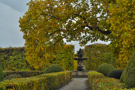 Autumn alley leading to a fountain in the Chateau Garden of Kromeriz, Czech Republicの写真素材