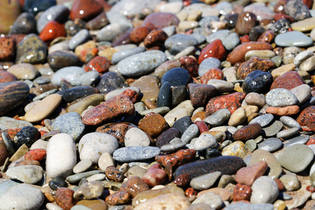 Beautiful colorful rocks on beachの写真素材