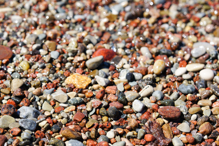Beautiful colorful rocks on beachの写真素材