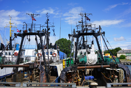 fishing ships in the port of Liepaja, Latviaの写真素材