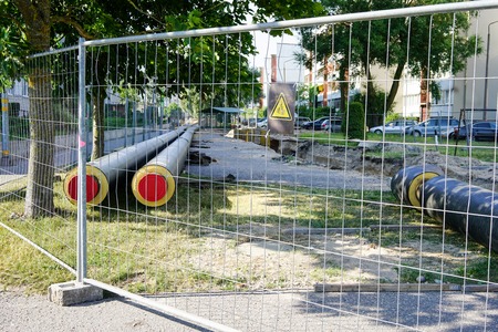 replacement and reconstruction of the heating system pipelines on the street in the cityの写真素材