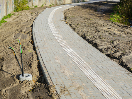 New pavement paving with integrated guidelines for people with visual impairmentの写真素材