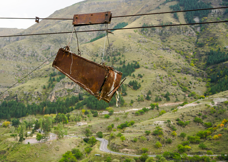 old rope and pulley transport system for moving building materials and cement mortar in the mountainsの写真素材