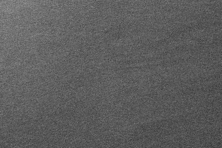 A closeup view of sand on the seafront, black sand beach - Black Sea, Georgia, backgroundの写真素材