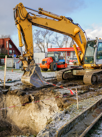 Hydraulic crawler excavator on a construction siteの写真素材