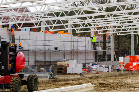 new building construction site, wall and metal roof constructionsの写真素材