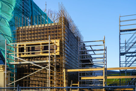 Concrete formwork with a folding mechanism and floor beams on construction site of a new modern...