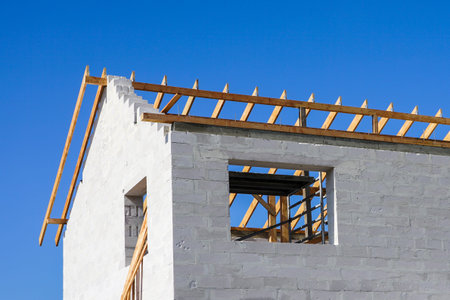 new two storey residential house under construction, exterior view