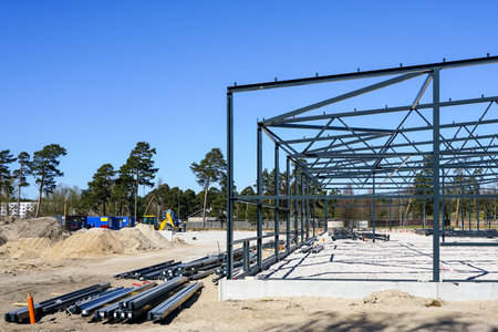 In the construction site new modern steel structure is under construction