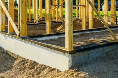 simple lightweight wooden frame building base construction, foundation waterproofing