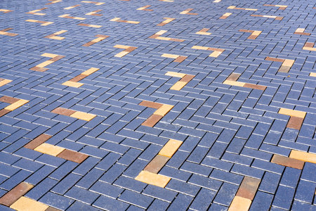 a new stylishly paved square with interesting colorful accents