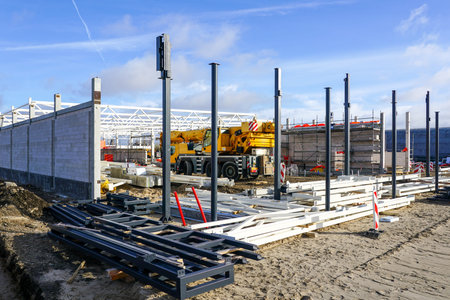 construction of a new modern store building using prefabricated metal and concrete structures