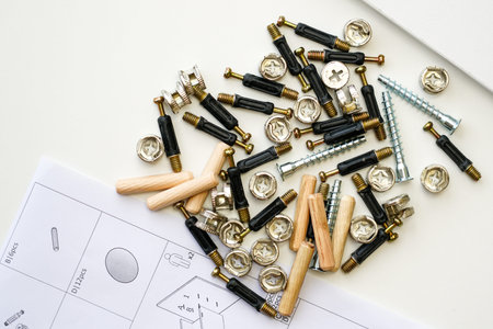New white laminated chipboard furniture self mounting set with fitting screws, wooden pins,...