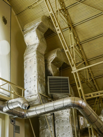Thermally insulated ventilation and heating system elements in a large hall, industrial ventilation, air condition and heatingの写真素材