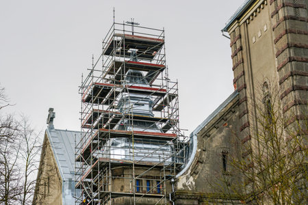 Replacement of the tin roofing of the towers of an old Lutheran masonry church using a complex form...