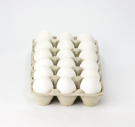 Carton of fresh white eggsの写真素材