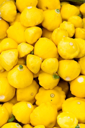 Yellow squash on display at the farmerの写真素材