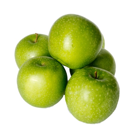 Arrangement of freshly harvested Granny Smith apples isolated on whiteの写真素材