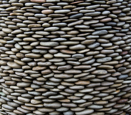 Background of arranged pebbles stones or rocksの写真素材
