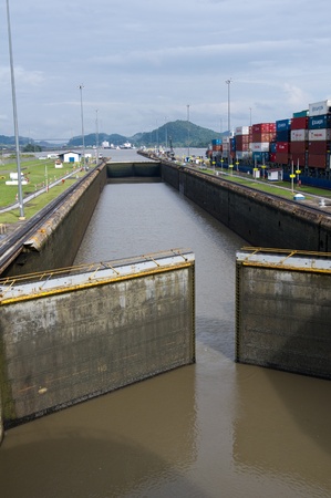 Gates of the Miraflores Locks in Panama Canal opening to allow ships inのeditorial素材