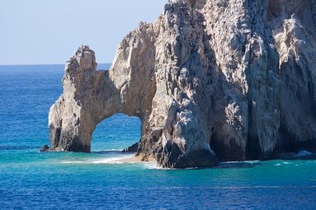 El Arco rock formation rises out of a crystal blue seaの写真素材