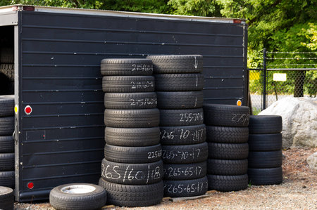 A stack of automobile tires ready for use