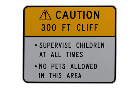A sign warns of danger hazardous cliff ahead