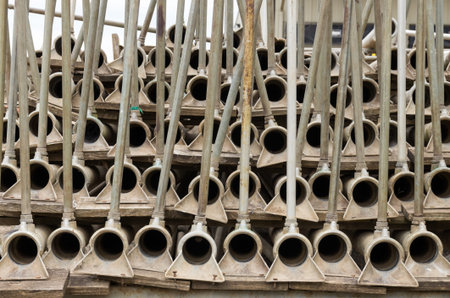A stack of aluminum irrigation pipe ready to add water