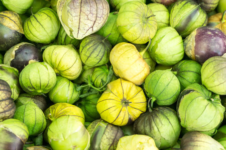 Fresh tomatillos on display at the farmers market