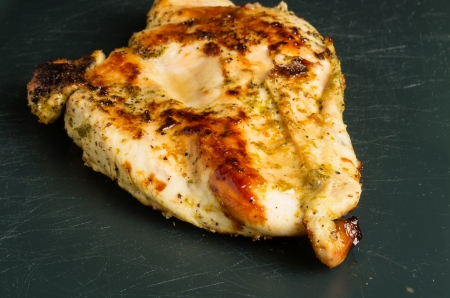 A grilled chicken breast ready to sliceの写真素材