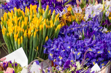 Fresh floral bouquets on display at the farmers marketの写真素材