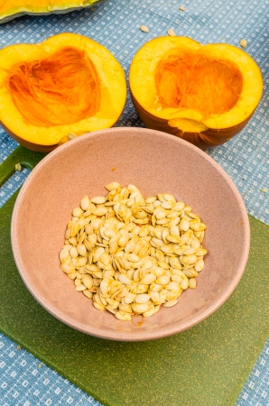 Pumpkins cut open to extract the seedsの写真素材