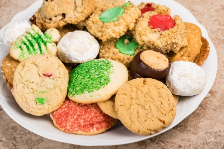 A plate or tray of mixed homemade sweet cookies ready to serveの写真素材