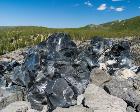 Black glassy obsidian inside a volcanoの写真素材