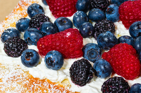 Fresh berries on a cream filled tartの写真素材