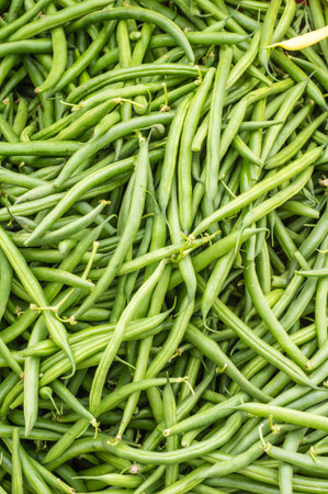 Green beans or snap beans in a bulk display at the market