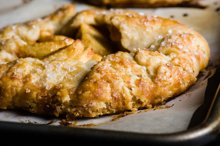Apple tart on a baking sheet showing apple slicesの写真素材