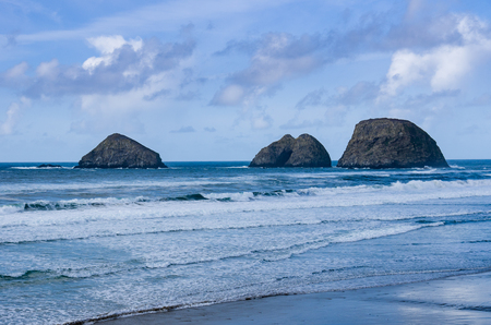Storm, Finley and Shag Rocks in the Pacific Ocean near Oceanside Oregonの写真素材