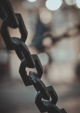 Close up of chain links, selective focus and shallow depth of field.の写真素材