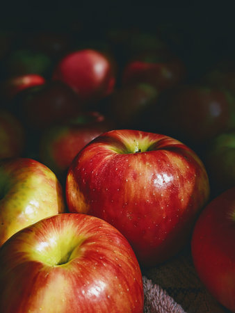 Ripe red apples in a basket. Selective focus. Toned.